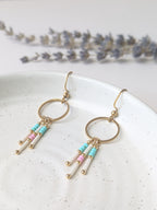 Dangle earrings | Stainless steel | Trio of pearls